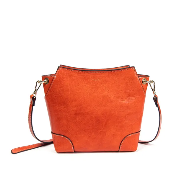 kate-lee-bonbon-tane-a-sac-bandouli-re-corail-vachette-glac-e image 1